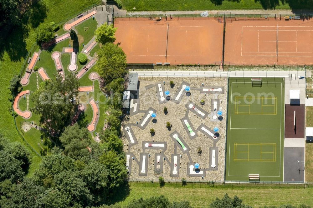 Herne from the bird's eye view: Sports facility Wanne Im Sportpark in Herne in the state North Rhine-Westphalia NRW. The park features a running track with a soocer court, tennis courts, a basketball court and a mini golf course