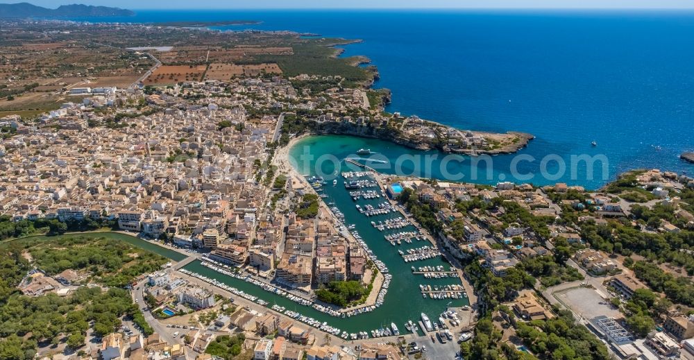 Manacor from the bird's eye view: Pleasure boat marina with docks and moorings on the shore area Cala Manacor in Manacor in Balearic island of Mallorca, Spain