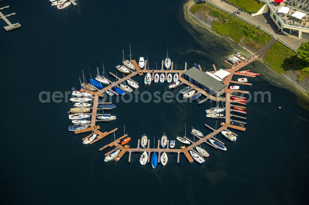 Heimbach from above - Pleasure boat marina with docks and moorings on the shore area Rurtalsperre Schwammenauel on street L15 in the district Hasenfeld in Heimbach in the state North Rhine-Westphalia, Germany