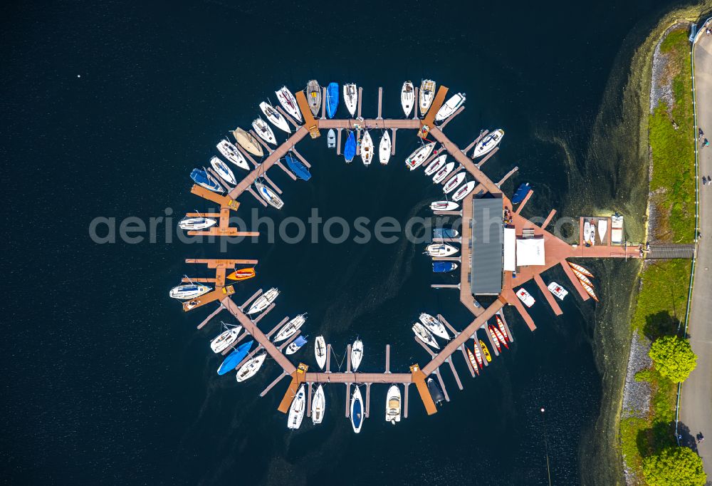 Aerial image Heimbach - Pleasure boat marina with docks and moorings on the shore area Rurtalsperre Schwammenauel on street L15 in the district Hasenfeld in Heimbach in the state North Rhine-Westphalia, Germany