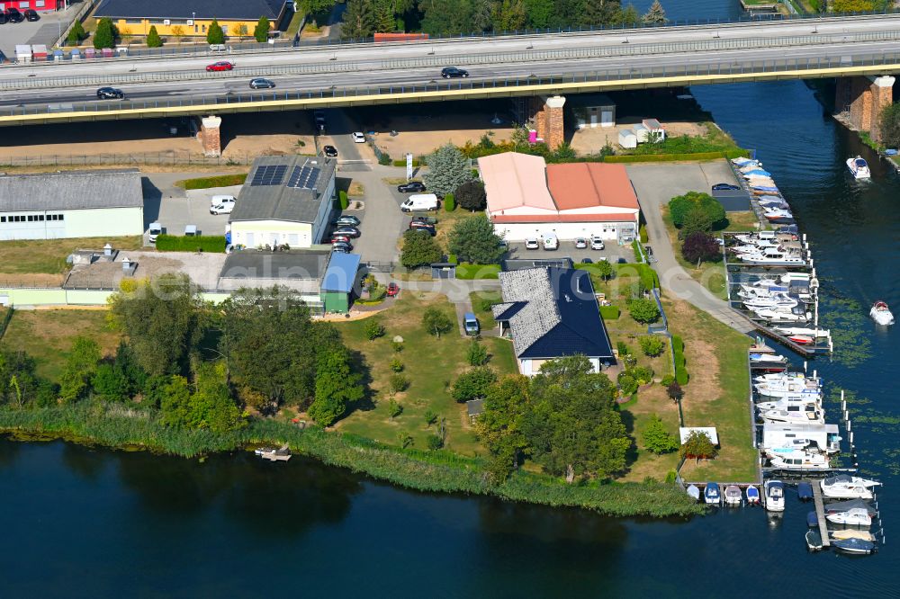 Rüdersdorf from above - Pleasure boat marina with docks and moorings on the shore area Strausberger Muehlenfliess - Hohler See in Ruedersdorf in the state Brandenburg, Germany