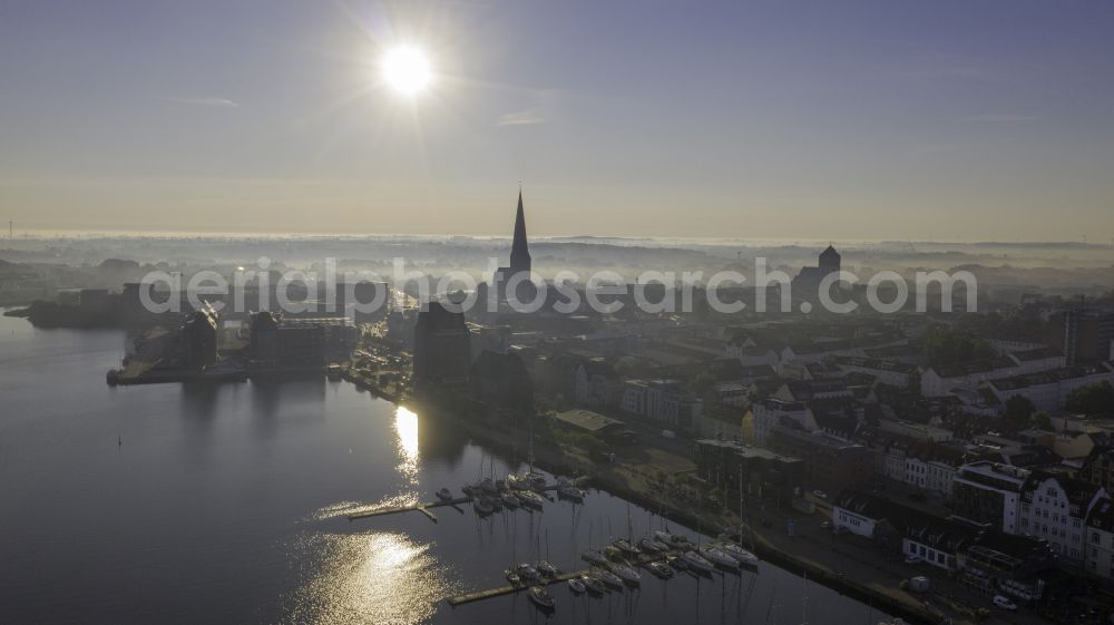 Rostock from above - Pleasure boat marina with docks and moorings on the shore area of Unterwarnow on Alten Stadthafen on street Am Strande in the district Stadtmitte in Rostock at the baltic sea coast in the state Mecklenburg - Western Pomerania, Germany