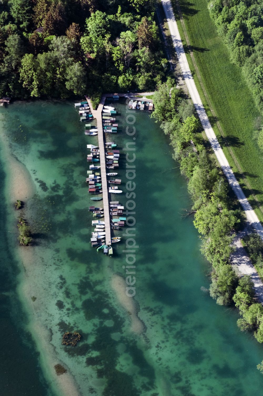 Kissing from the bird's eye view: Pleasure boat marina with docks and moorings on the shore area of Weitmansee in Kissing in the state Bavaria, Germany