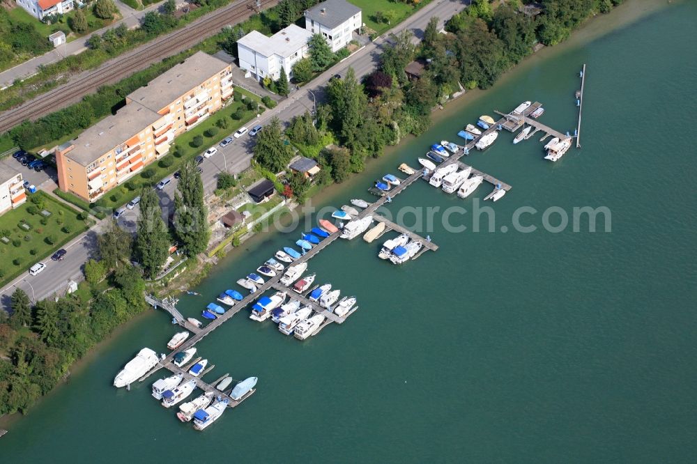 Grenzach-Wyhlen from the bird's eye view: Pleasure boat marina with docks and moorings on the shore area of the river Rhine in Grenzach-Wyhlen in the state Baden-Wuerttemberg