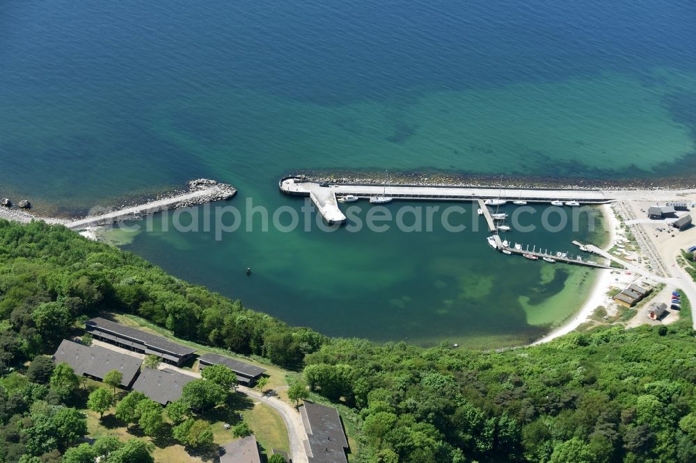 Aerial image Allinge - Pleasure boat marina with docks and moorings on the shore area in Allinge in Region Hovedstaden, Denmark