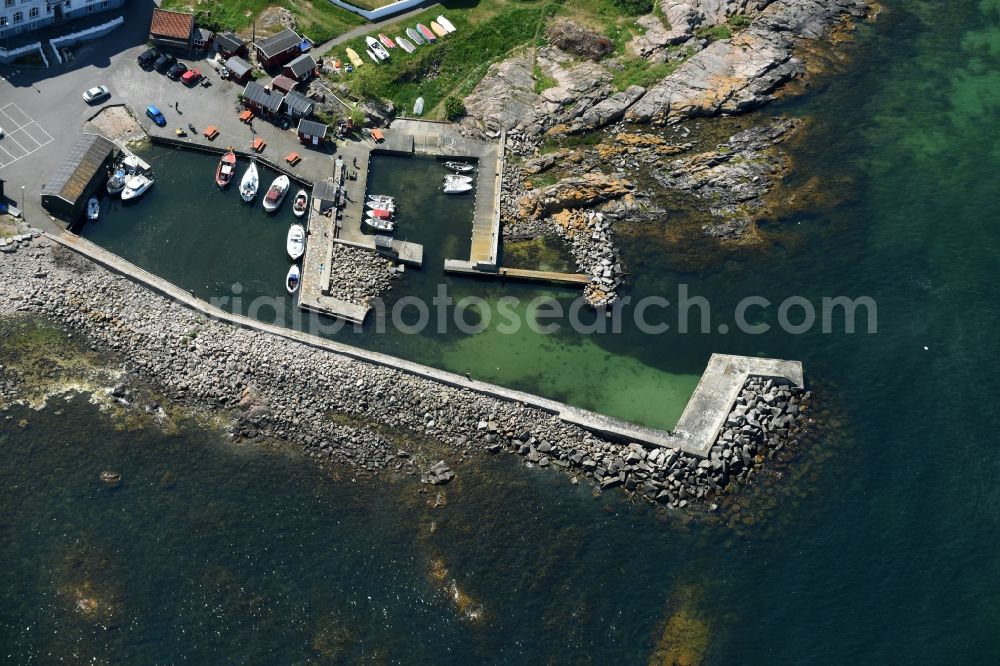 Allinge- Sandvig from above - Pleasure boat marina with docks and moorings on the shore area in Allinge- Sandvig on Bornholm Island in Region Hovedstaden, Denmark