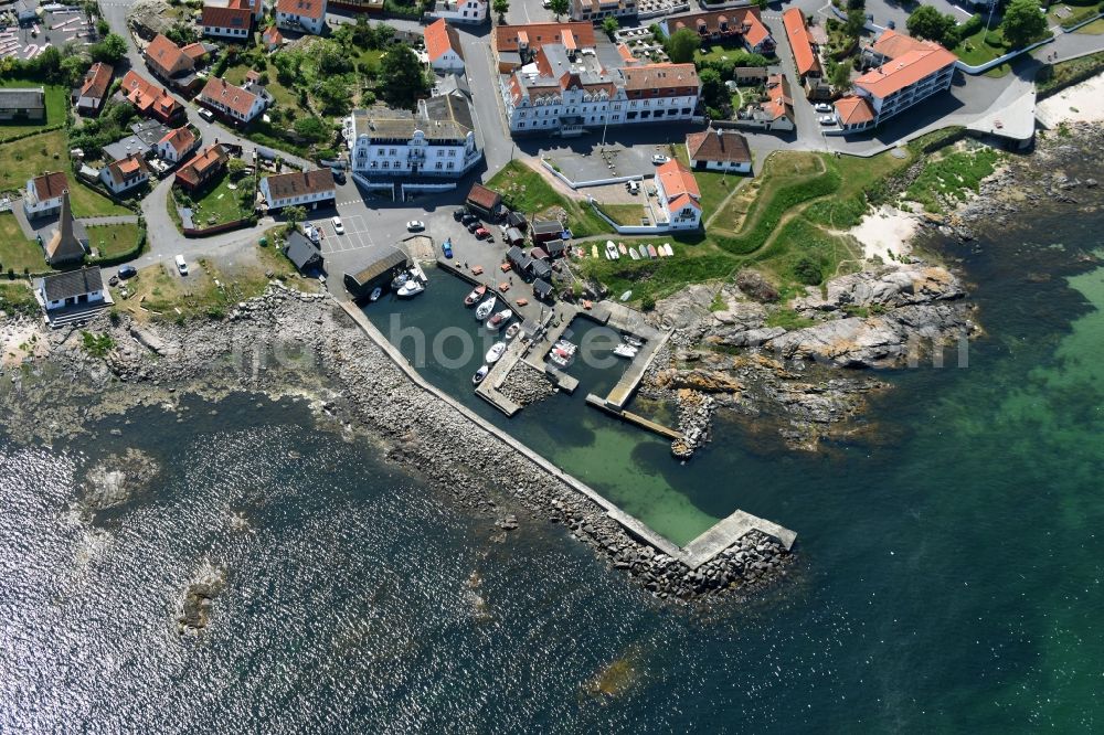 Allinge- Sandvig from the bird's eye view: Pleasure boat marina with docks and moorings on the shore area in Allinge- Sandvig on Bornholm Island in Region Hovedstaden, Denmark