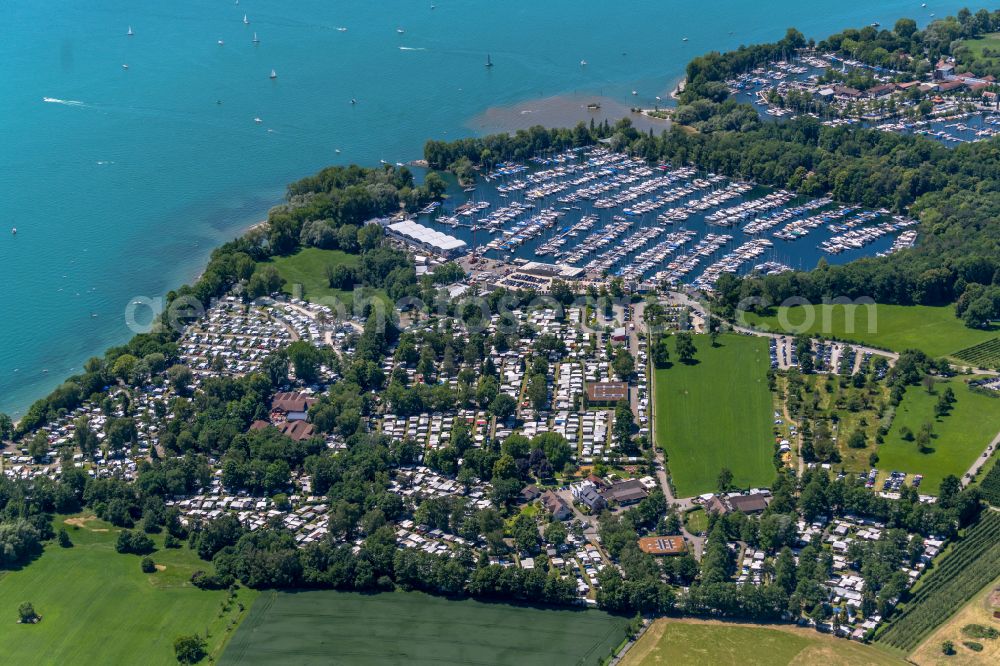 Kressbronn am Bodensee from the bird's eye view: Pleasure boat marina with docks and moorings on the shore area of Lake of Constance in the district Schnaidt in Kressbronn am Bodensee in the state Baden-Wuerttemberg, Germany