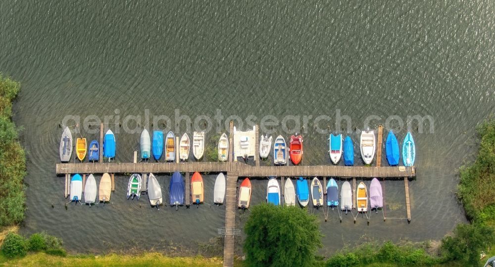 Krakow am See from above - Pleasure boat marina with docks and moorings on the shore area in Krakow am See in the state Mecklenburg - Western Pomerania