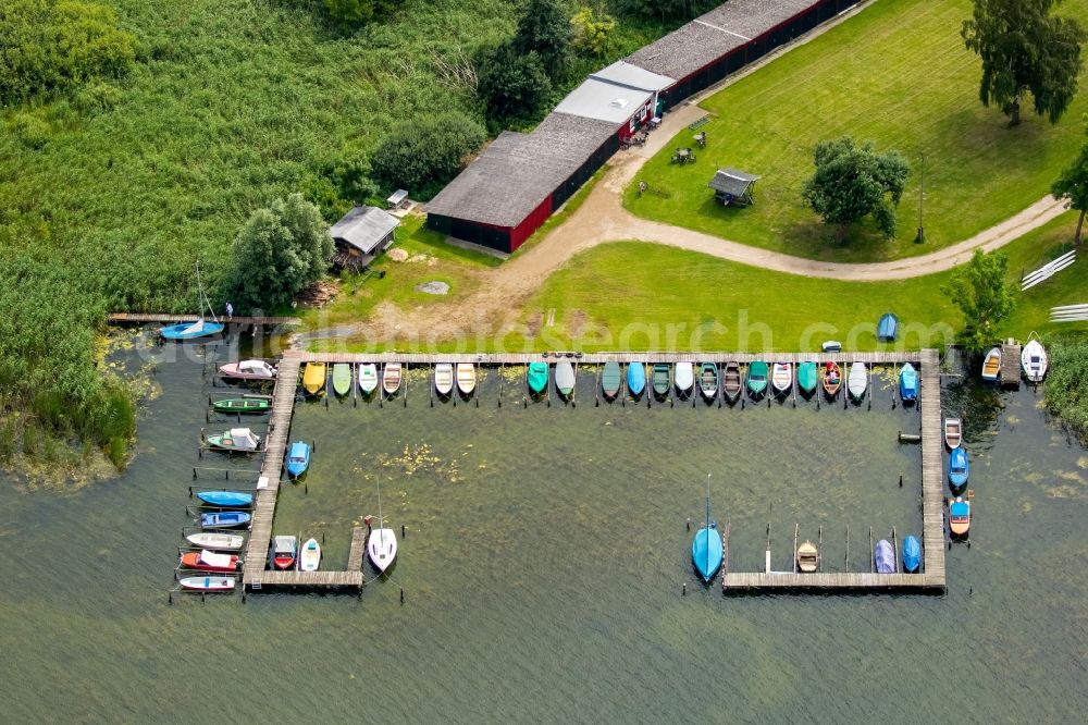 Aerial image Krakow am See - Pleasure boat marina with docks and moorings on the shore area in Krakow am See in the state Mecklenburg - Western Pomerania