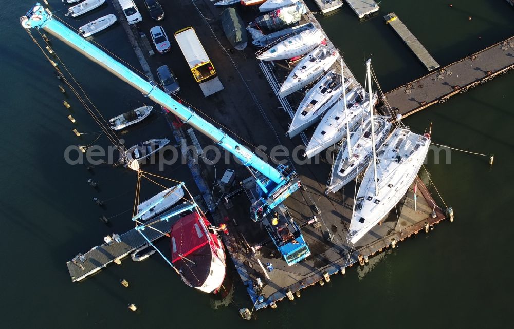 Altefähr from the bird's eye view: Pleasure boat marina with docks and moorings on the shore area of Baltic Sea in Altefaehr in the state Mecklenburg - Western Pomerania, Germany