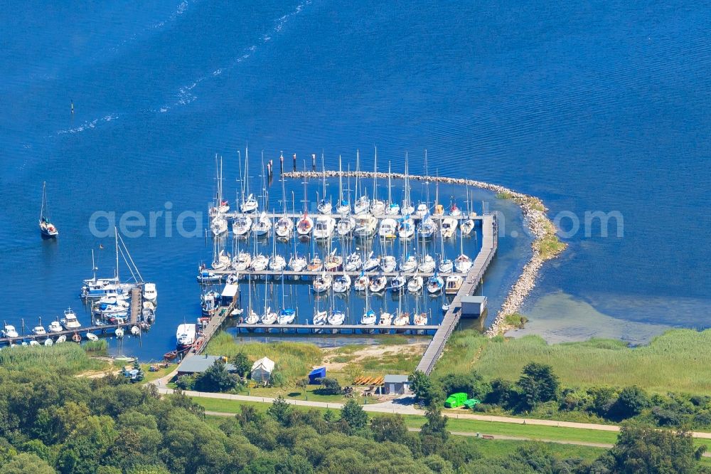 Insel Hiddensee from the bird's eye view: Pleasure boat marina with docks and moorings on the shore area of Baltic Sea in the district Kloster in Insel Hiddensee in the state Mecklenburg - Western Pomerania, Germany