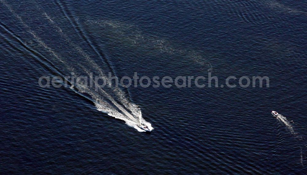 Loissin from above - Sport Boat in motion on the water surface in Greifswalder Bodden of Baltic - Sea in Loissin in the state Mecklenburg - Western Pomerania