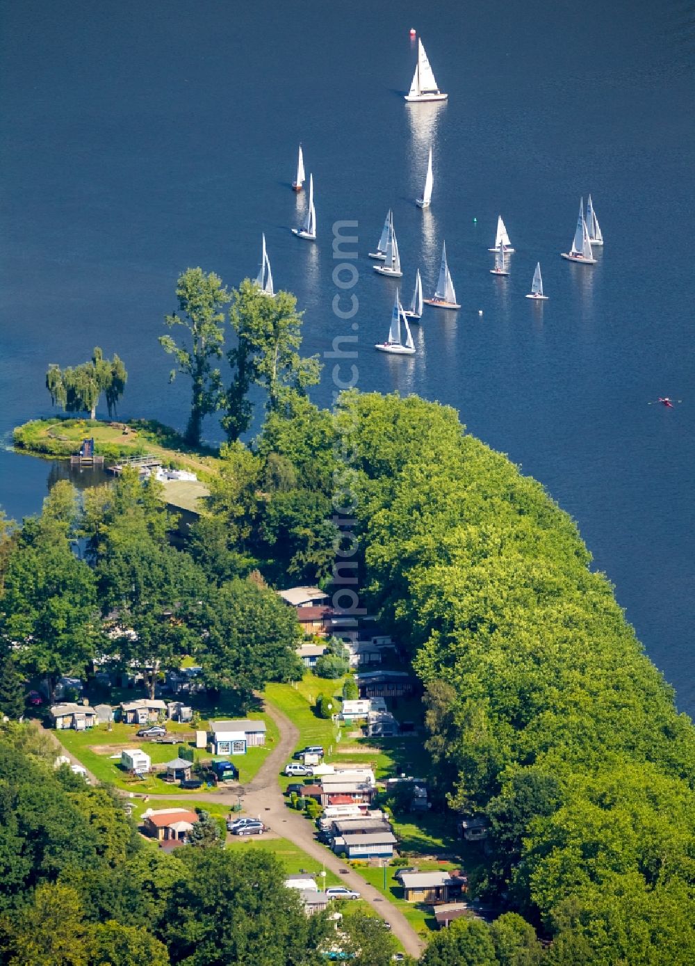 Essen from the bird's eye view: Sailboat under way auf der Ruhr in Essen in the state North Rhine-Westphalia