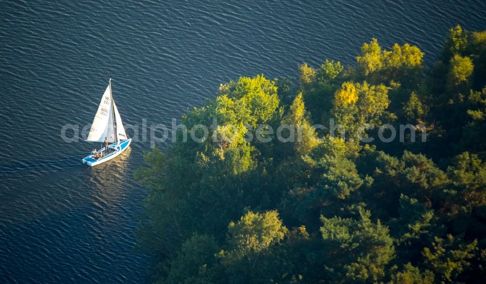 Duisburg from above - Sailboat under way on the Wildfoerstersee lake in Duisburg in the state North Rhine-Westphalia