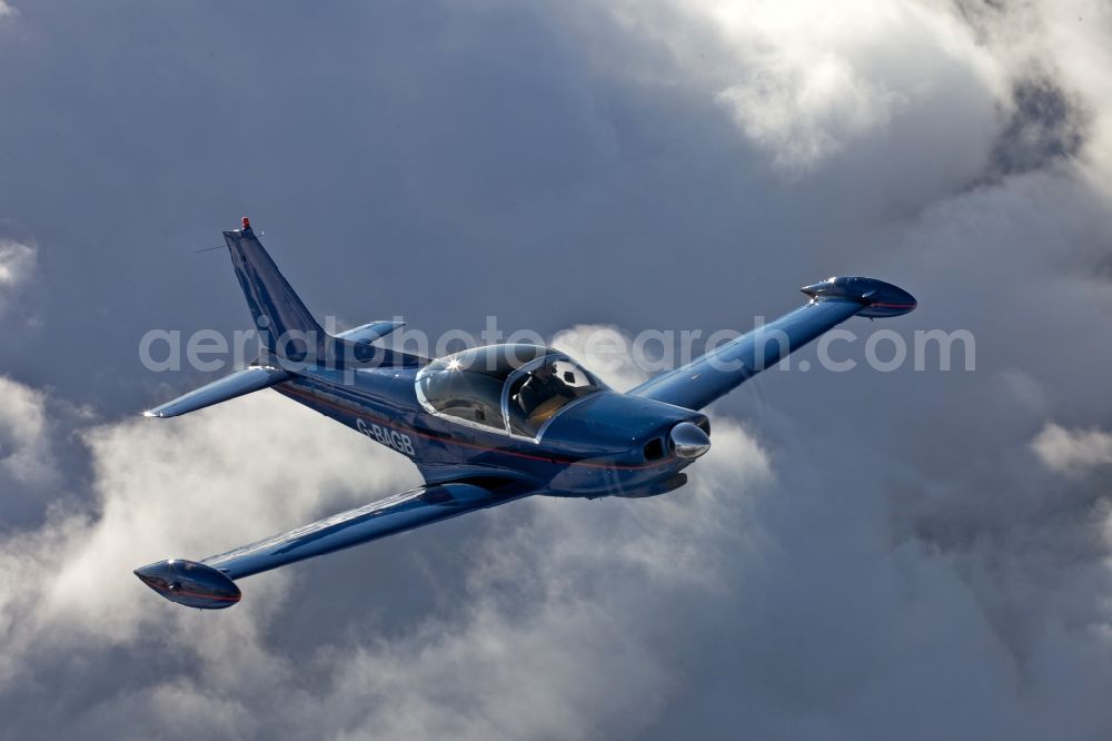 Mengen from the bird's eye view: Sport Aircraft SIAI-Marchetti F.260 in flight at Mengen in the state of Baden-Wuerttemberg