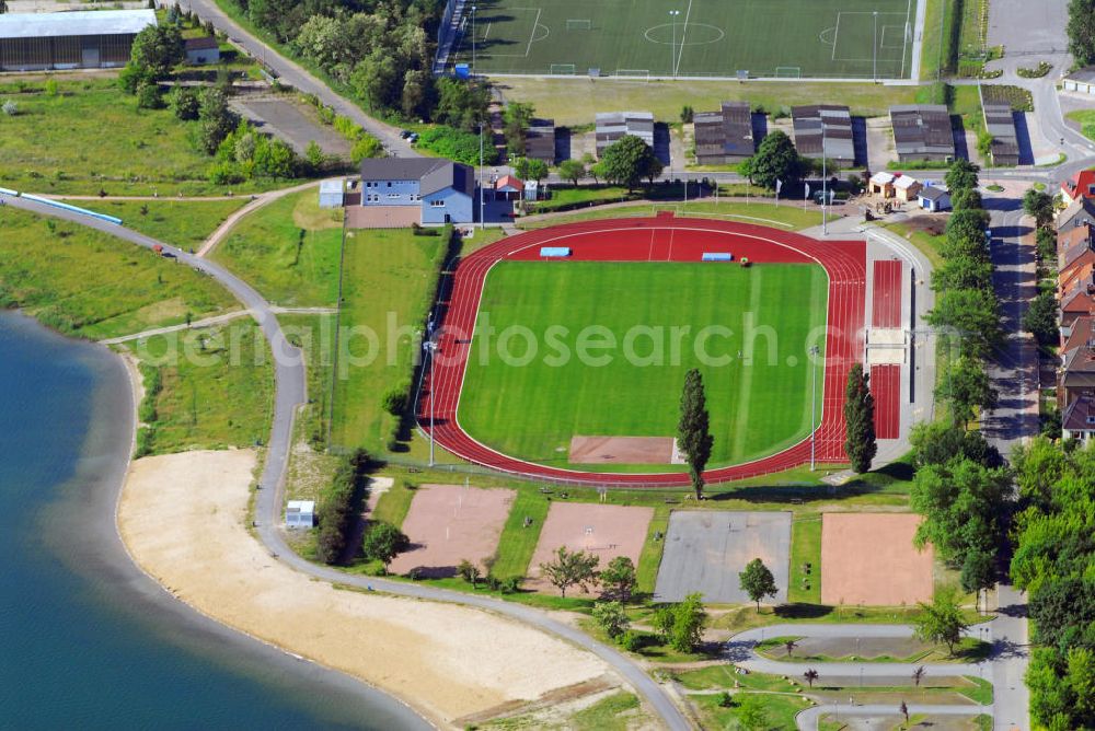 Berlin from above - Blick auf den Sportpark Süd mit dem städtischen Stadion am Goitzschesee. Das Stadion ist die Heimspielstätte vom VfL Eintracht Bitterfeld, es verfügt über eine Kapazität von 2000 Stehplätzen. Kontakt: VfL Eintracht Bitterfeld 1992 e.V., Sportpark Süd, Ortsteil Bitterfeld, Niemegker Strasse 19, 06749 Bitterfeld-Wolfen, Tel. & Fax 03493 41243, E-Mail: webmaster@vfl-eintracht-bitterfeld.de,