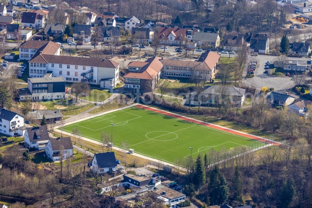 Arnsberg from the bird's eye view: Sports grounds and football pitch of DJK Gruen-Weiss Arnsberg e.V. on Milanweg in Arnsberg at Ruhrgebiet in the state North Rhine-Westphalia, Germany