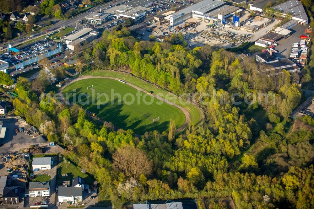 Hamm from above - Sports grounds and football pitch in a forest on Hueserstrasse in the district of Bockum-Hoevel in Hamm in the state of North Rhine-Westphalia