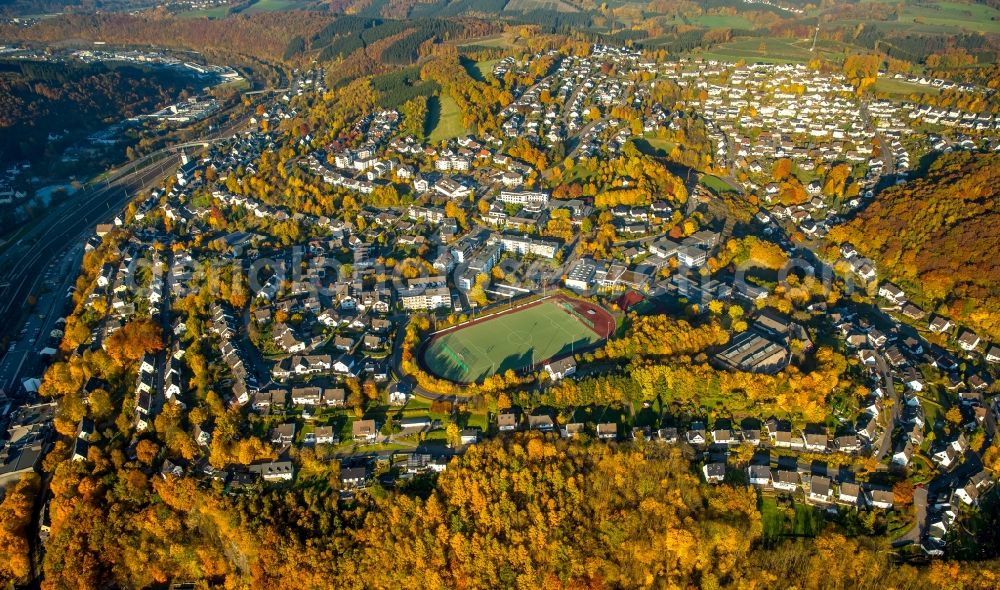 Aerial photograph Finnentrop - Ensemble of sports grounds of F.C.Finnentrop 1979 e.V. in the autumnal South of Finnentrop in the state of North Rhine-Westphalia