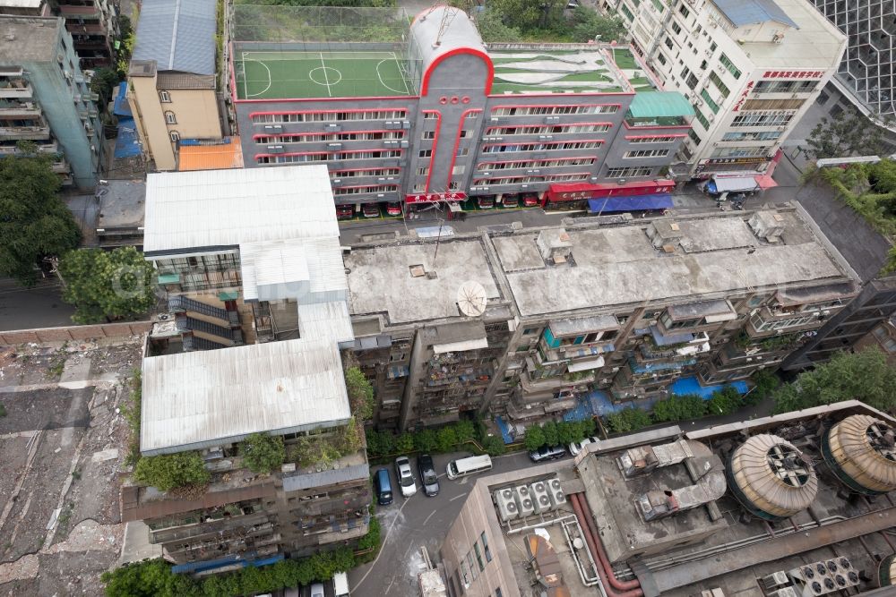 Chengdu Shi from the bird's eye view: Sports grounds and football pitch on roof top in Chengdu Shi in Sichuan Sheng, China