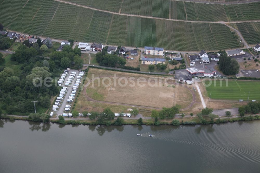 Traben-Trarbach from the bird's eye view: Sports grounds and football pitch next to the RV parking space on the Moselle in Traben-Trarbach in the state Rhineland-Palatinate, Germany