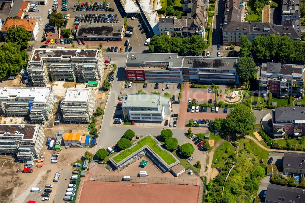 Essen from above - Sports fields Soccer Place of VfL Sportfreunde 07 Food e.V. in Essen in North Rhine-Westphalia. Behind a gym of Kieser Training AG