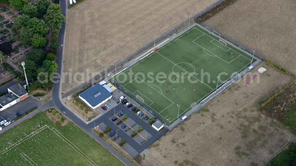 Bornheim from the bird's eye view: Sports field and clubhouse of TuS Germania Hersel 1910 e.V. in Bornheim-Hersel in the state North Rhine-Westphalia, Germany