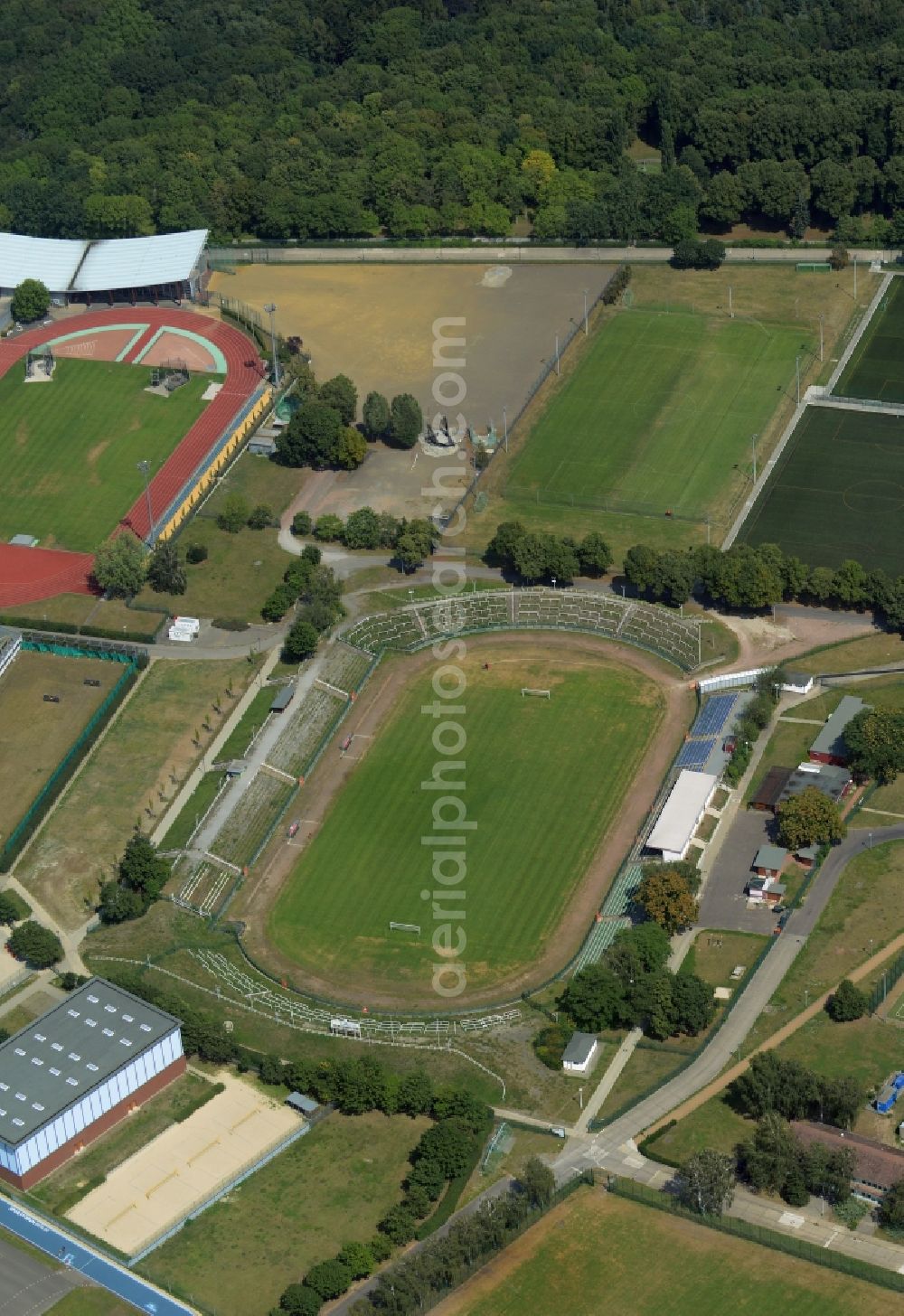 Berlin from above - Sports grounds and halls of the Sportforum Hohenschoenhausen in the Alt-Hohenschoenhausen part of the district of Lichtenberg in Berlin in Germany. The second largest sports and training facilities of Berlin include a complex of sports halls which are listed as protected buildings