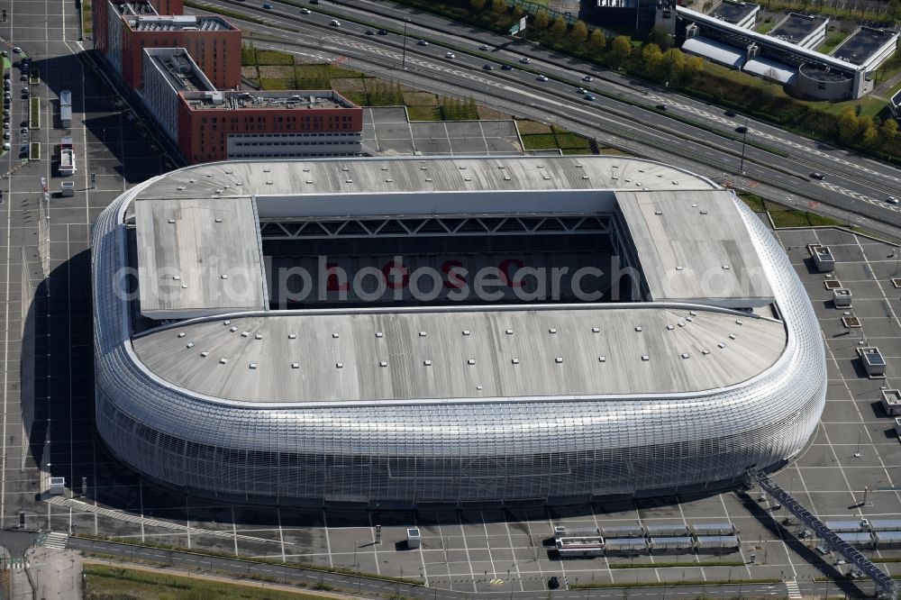 Lille from above - Sports facility grounds of the arena of the stadium Stade Pierre-Mauroy before European Football Championship Euro 2016 destrict Villeneuve-d'Ascq in Lille in Nord-Pas-de-Calais Picardy, France. The building was by the Eiffage group designed by the architect Valode et Pistre architectes and Accueil - Atelier Ferret Architectures