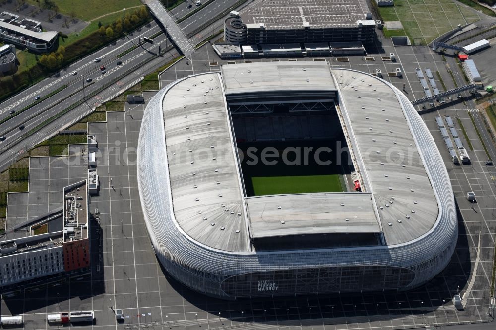 Aerial image Lille - Sports facility grounds of the arena of the stadium Stade Pierre-Mauroy before European Football Championship Euro 2016 destrict Villeneuve-d'Ascq in Lille in Nord-Pas-de-Calais Picardy, France. The building was by the Eiffage group designed by the architect Valode et Pistre architectes and Accueil - Atelier Ferret Architectures