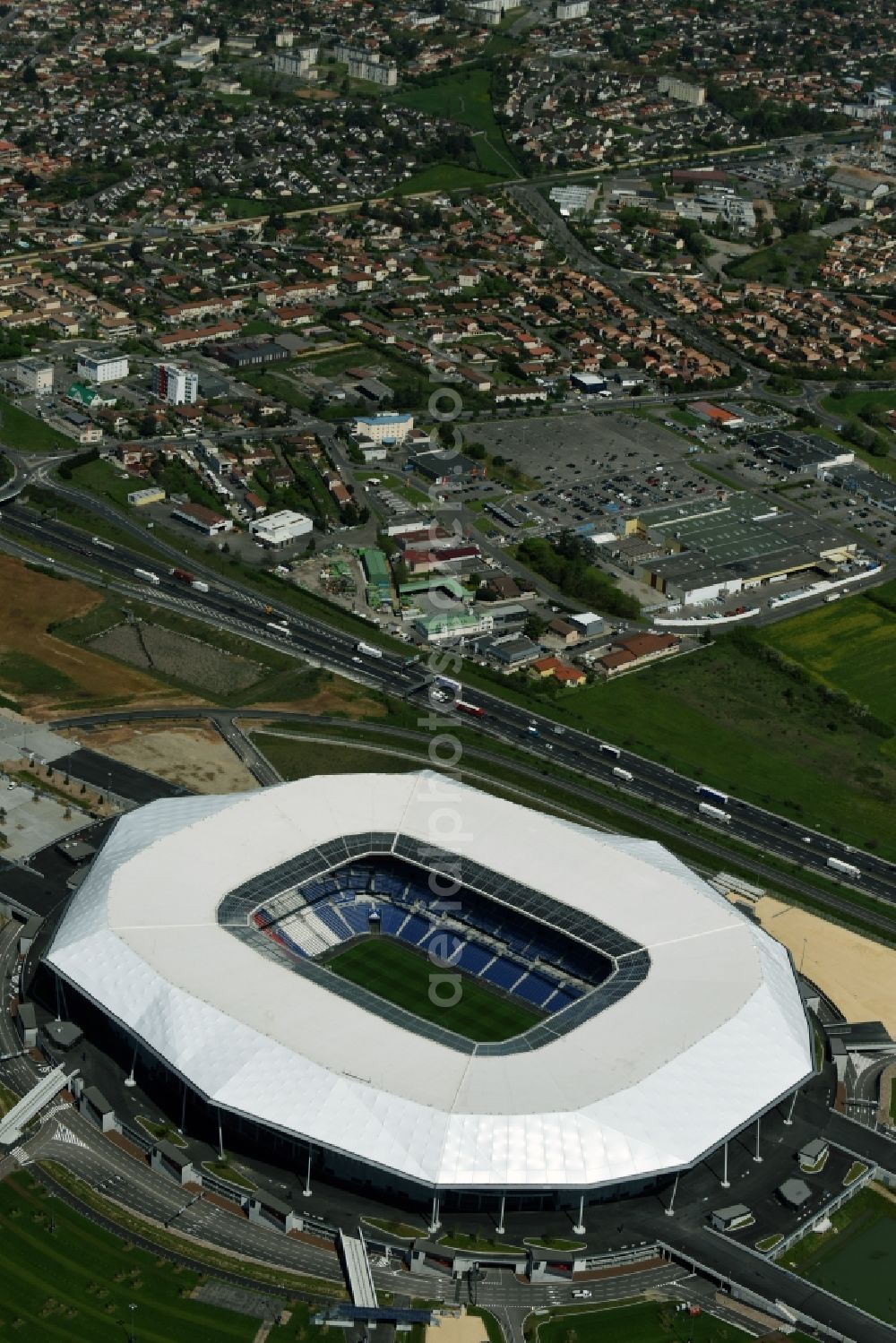 Lyon Decines-Charpieu from the bird's eye view: Sports facility grounds of the Arena stadium Stade des Lumieres im Parc Olympique Lyonnais before the European Football Championship 2016 in Lyon - Decines-Charpieu in Auvergne Rhone-Alpes, France