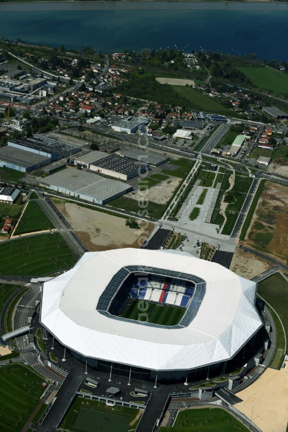 Lyon Decines-Charpieu from the bird's eye view: Sports facility grounds of the Arena stadium Stade des Lumieres im Parc Olympique Lyonnais before the European Football Championship 2016 in Lyon - Decines-Charpieu in Auvergne Rhone-Alpes, France