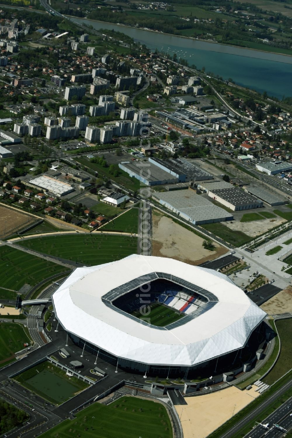 Lyon Decines-Charpieu from the bird's eye view: Sports facility grounds of the Arena stadium Stade des Lumieres im Parc Olympique Lyonnais before the European Football Championship 2016 in Lyon - Decines-Charpieu in Auvergne Rhone-Alpes, France