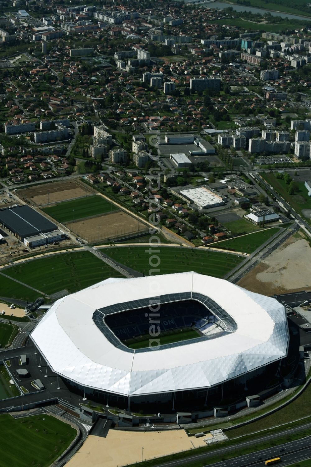 Aerial photograph Lyon Decines-Charpieu - Sports facility grounds of the Arena stadium Stade des Lumieres im Parc Olympique Lyonnais before the European Football Championship 2016 in Lyon - Decines-Charpieu in Auvergne Rhone-Alpes, France