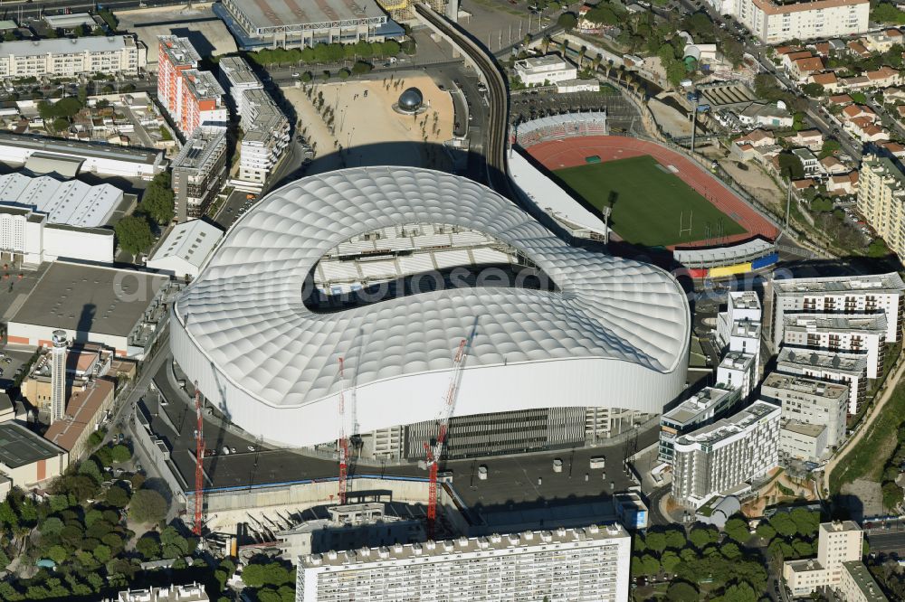 Marseille from above - Sports facility grounds of the Arena stadium Stade Orange Velodrome on street Boulevard Michelet in Marseille in Provence-Alpes-Cote d'Azur, France