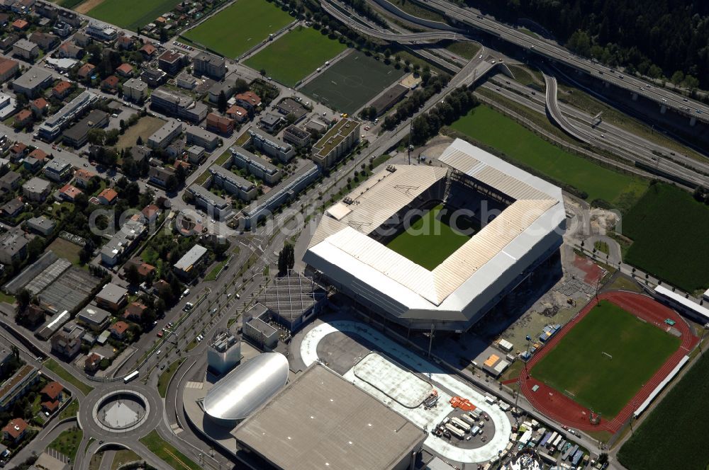 Innsbruck from above - Sports facility grounds of the Arena stadium Tivoli-Stadion on street Stadionstrasse in Innsbruck in Tirol, Austria