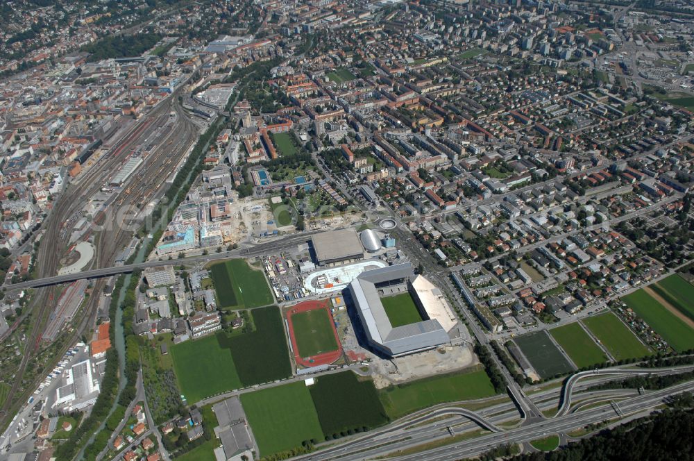 Innsbruck from above - Sports facility grounds of the Arena stadium Tivoli-Stadion on street Stadionstrasse in Innsbruck in Tirol, Austria