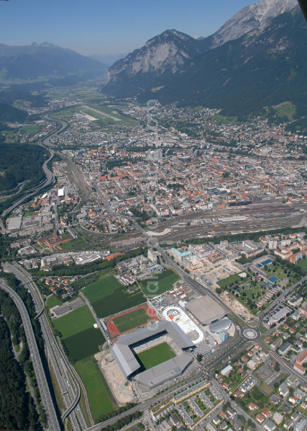 Innsbruck from above - Sports facility grounds of the Arena stadium Tivoli-Stadion on street Stadionstrasse in Innsbruck in Tirol, Austria