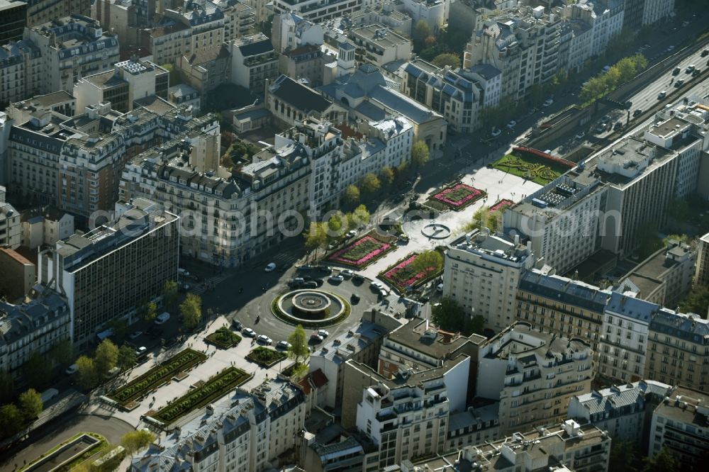 Paris from above - Fountain and roundabout at the intersection of Avenue de Charles de Gaulle, Rue de Chateau and Avenue de Madrid in the Neuilly-sur-Seine part of Paris, France