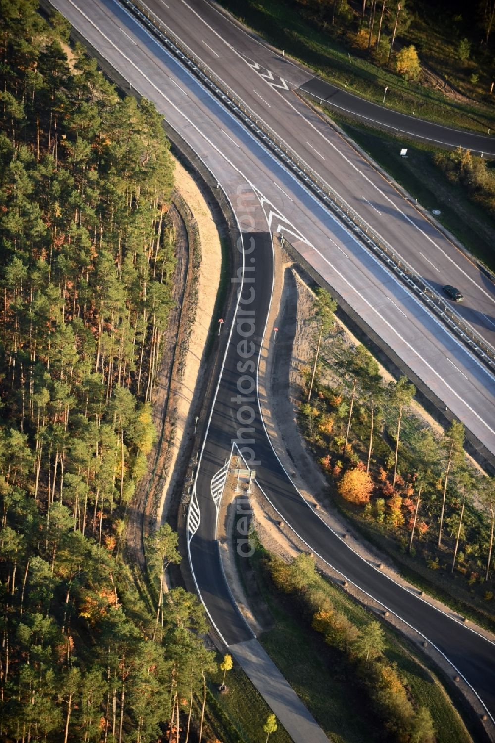 Aerial photograph Spreenhagen - Track construction on the Routing and traffic lanes during the motorway service station and parking lot of the BAB A 12 E30 fuer LKW Lastkraftfahrzeuge im Gueterverkehr in Spreenhagen in the state Brandenburg