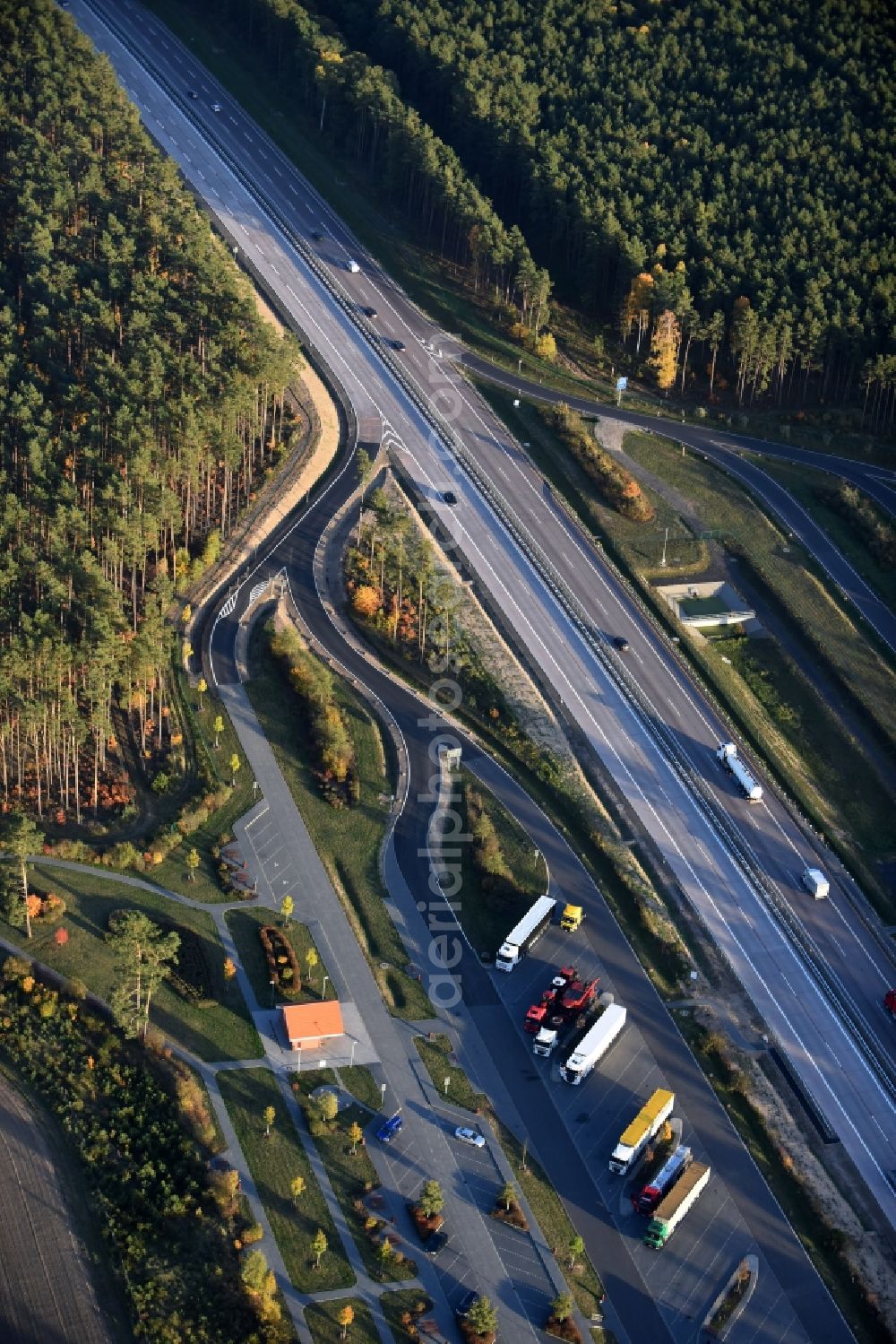 Spreenhagen from above - Track construction on the Routing and traffic lanes during the motorway service station and parking lot of the BAB A 12 E30 fuer LKW Lastkraftfahrzeuge im Gueterverkehr in Spreenhagen in the state Brandenburg