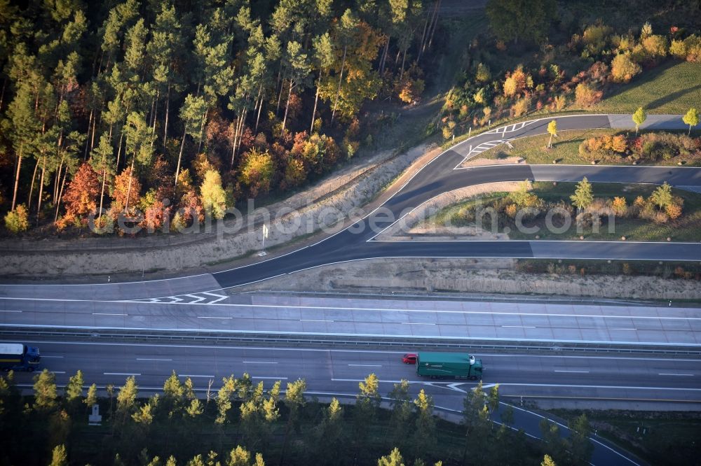 Spreenhagen from above - Track construction on the Routing and traffic lanes during the motorway service station and parking lot of the BAB A 12 E30 fuer LKW Lastkraftfahrzeuge im Gueterverkehr in Spreenhagen in the state Brandenburg