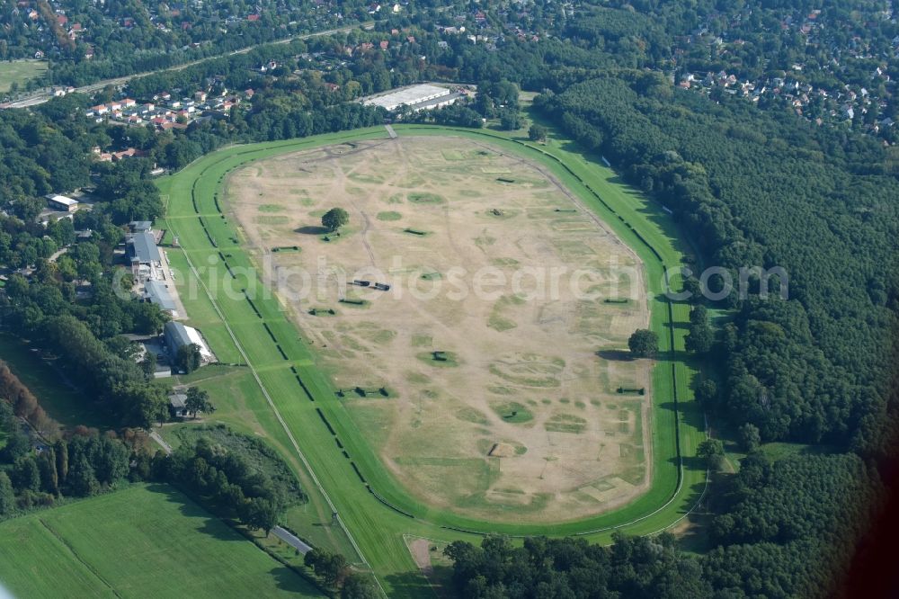 Aerial image Hoppegarten - Traces of the music festival Lollapalooza in the lawns on the race track of the Rennbahn - race track Rennbahn Hoppegarten GmbH & Co. KG at the Goetheallee in Hoppegarten in the state of Brandenburg, Germany