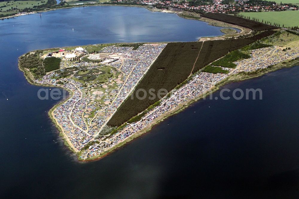 Muldestausee from the bird's eye view: Sputnik Spring Break 2012 Festival on the Pouch peninsula in the town of Muldestausee in Saxony-Anhalt