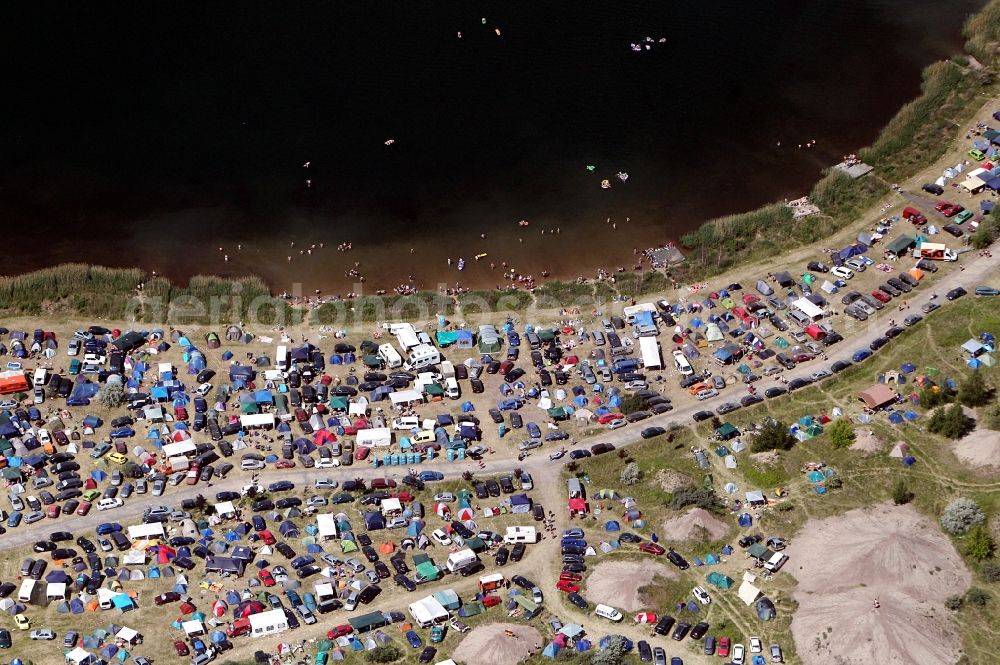 Muldestausee from the bird's eye view: Sputnik Spring Break 2012 Festival on the Pouch peninsula in the town of Muldestausee in Saxony-Anhalt