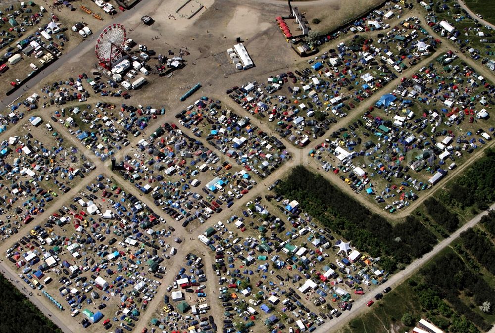 Muldestausee from the bird's eye view: Sputnik Spring Break 2012 Festival on the Pouch peninsula in the town of Muldestausee in Saxony-Anhalt