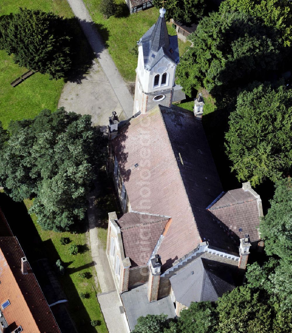 Aerial image Dessau-Rosslau - Blick auf die St. Marienkirche in Dessau-Rosslau. Die Grundmauern der Kirche stammen aus dem 14. Jahrhundert. Während der Schlacht um die Rosslauer Schanze brannte das Kirchengbäude 1626 ab und wurde anschließend wieder aufgebaut. View to the St. Mary church in Dessau-Rosslau. The foundation walls date back to the 14. century. During the battle around the Rosslauer Schanze in 1626 the church building burned down and was rebuilt.