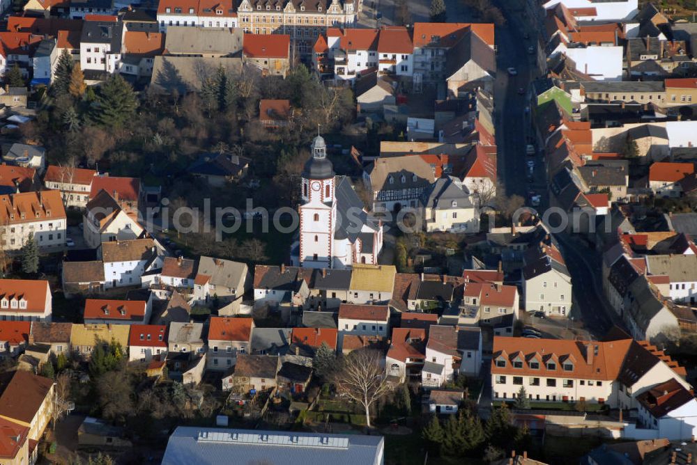 Aerial photograph Frohburg - Blick auf die St. Michaelis Kirche in Frohburg. Frohburg ist eine Kleinstadt im Leipziger Land. Die 1233 erbaute St. Michaelis Kirche steht im Zentrum der Altstadt. Stadt und Kirche bildeten über Jahrhunderte eine Schicksalsgemeinschaft. Die Geistlichen wurden immer von den Grundherren berufen und bestätigt. Kontakt: Ev.-Luth. St.-Michaelis-Kirchgemeinde Frohburg, Kirchplatz 1, 04654 Frohburg, Tel.: 034348/51352