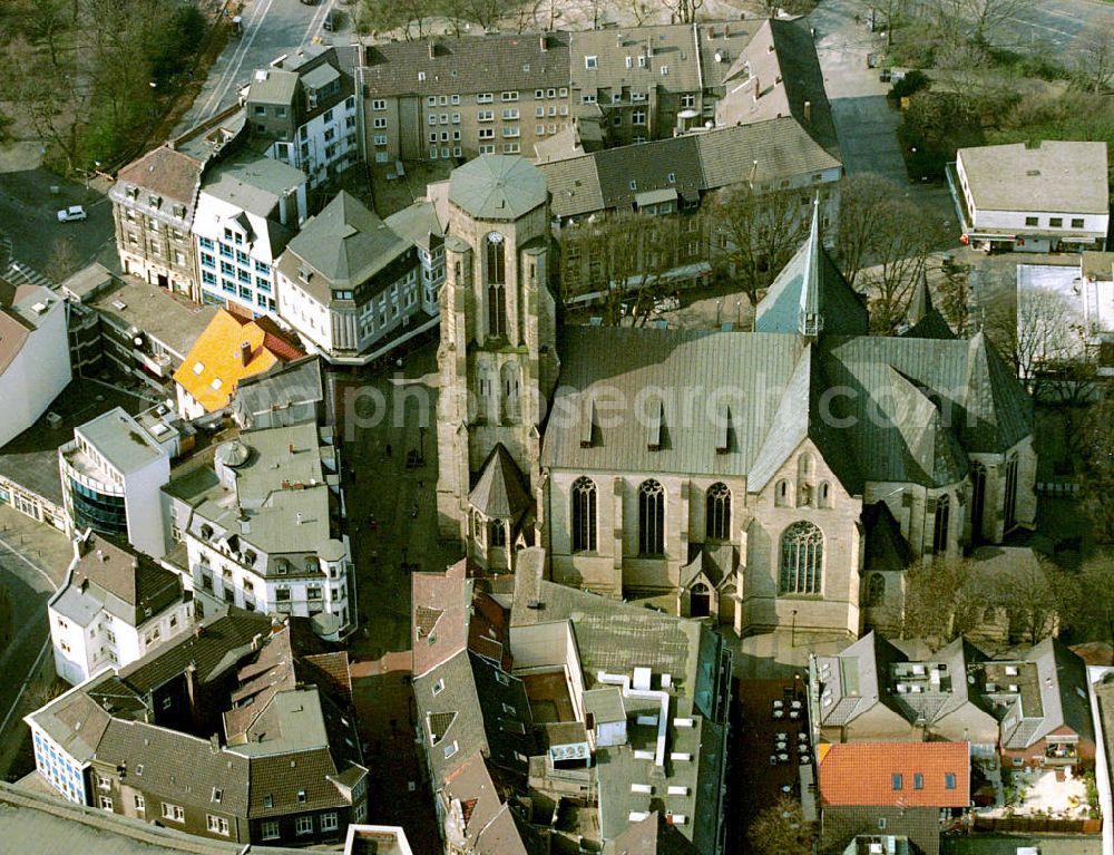 Aerial photograph Gelsenkirchen - Blick die Stadt Gelsenkirchen mit der St.Urbanus Kirche im Stadtteil Gelsenkirchen-Buer. Die Kirche wurde Ende des 19. Jahrhunderts in neugotischem Stil erbaut. Die Haube des Hauptturmes wurde im zweiten Weltkrieg zerstört. View to the town center of Gelsenkirchen and the St. Urbanus church in the administrative district Gelsenkirchen-Buer. The church was build in the end of the 19. century in an neo-Gothic architecture. The cap of the main tower was destroyed in the second world war.